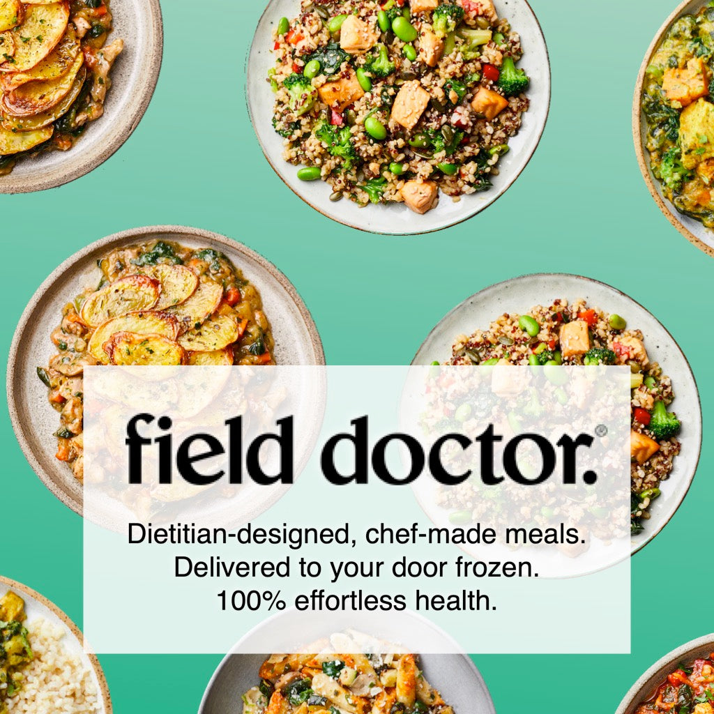 A banner for Field Doctor ready made meals. Several plates are arranged over a green background. Overlaid is the text: "Field Doctor. Dietitian-designed, chef-made meals. Delivered to your door frozen. 100% effortless health."