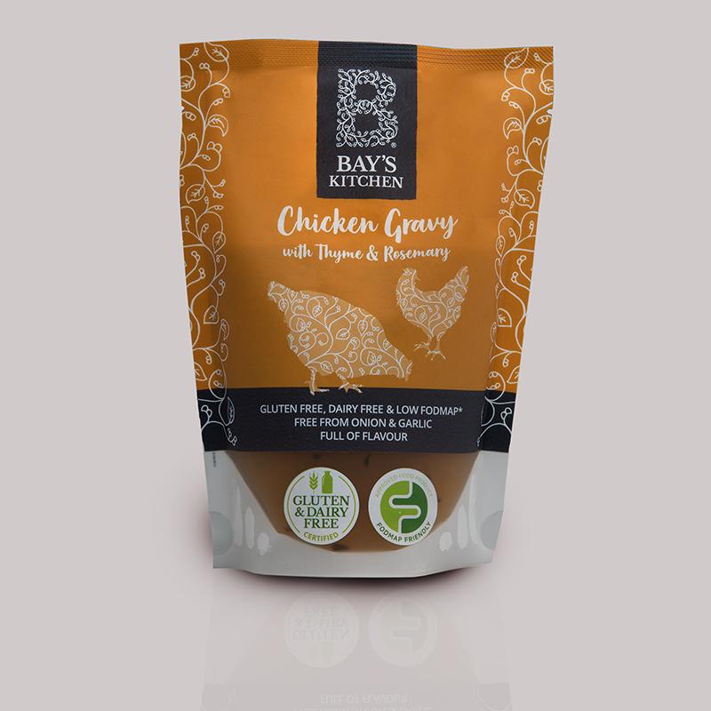 A packet of Bay's Kitchen Chicken Gravy on a grey background