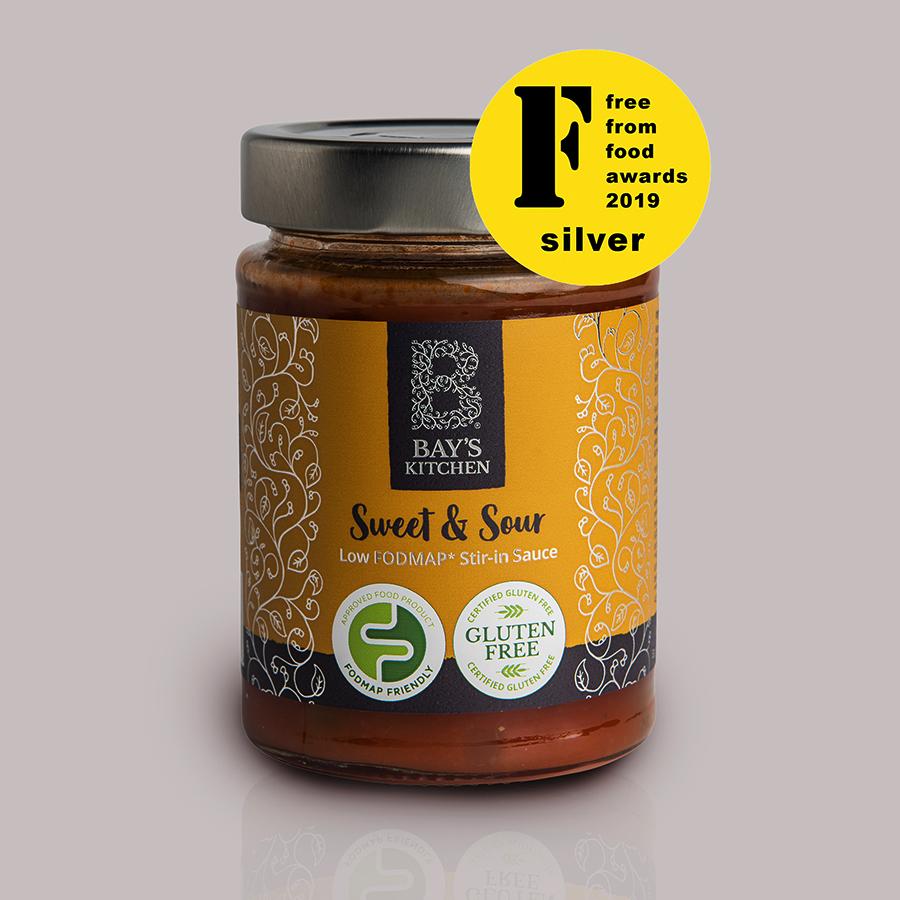 A jar of Bay's Kitchen award-winning Sweet & Sour sauce on a grey background