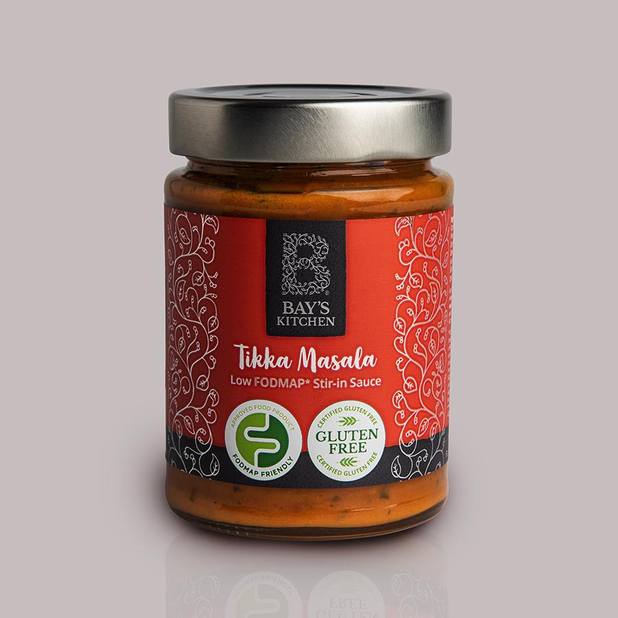 A jar of Bay's Kitchen Tikka Massala sauce on a grey background